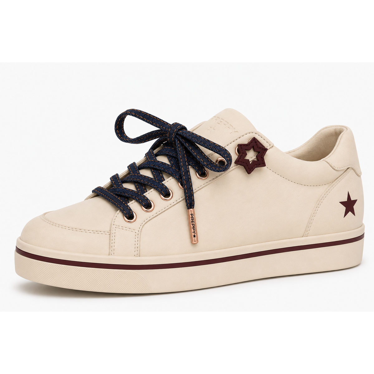 A low-top sneaker in cream-colored leather with navy blue laces, a navy star emblem on the heel, and a rose gold star emblem on the ankle, set against a plain white background.