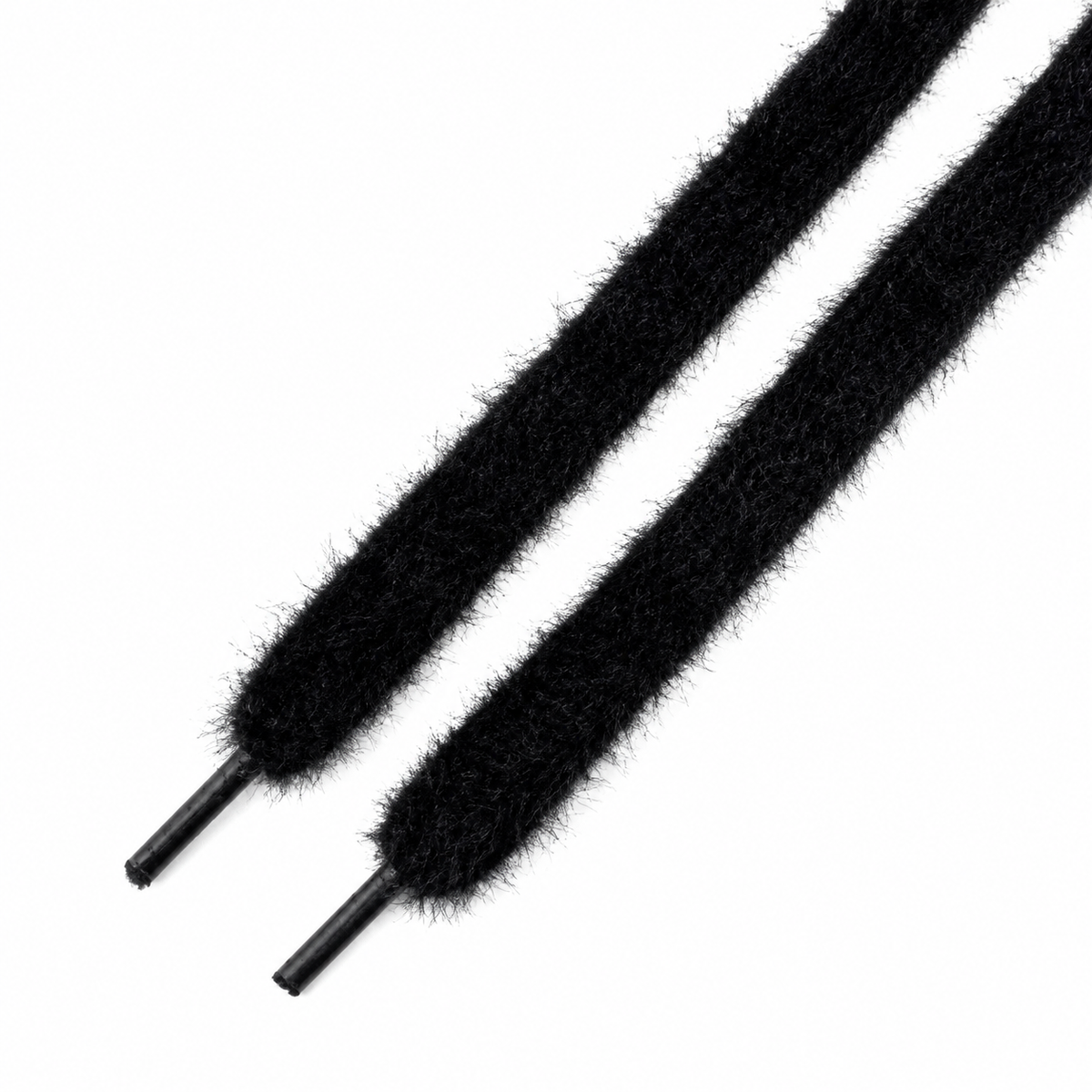 Black fuzzy shoelaces with black plastic aglets, shown diagonally on a plain white background.